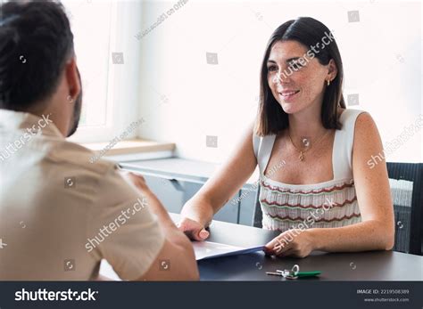 real estate agent sitting office desk images stock