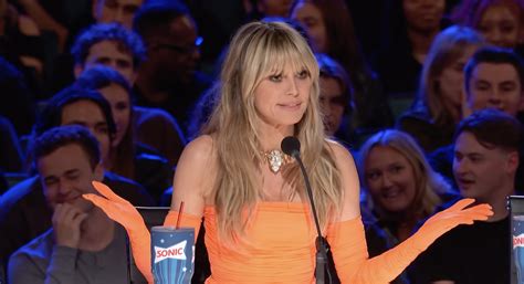 AGT's Heidi Klum, 50, strips totally naked as she poses in hotel room