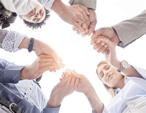 premium photo business people holding hands  teamwork
