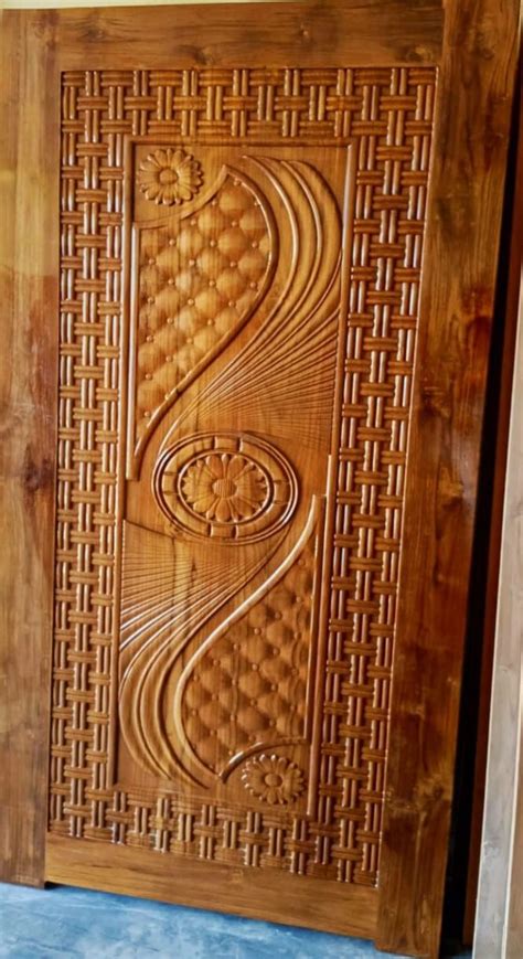 designer wooden door  intricate carvings