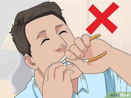Como Arrancar Um Dente Mole Com A Mão - 3 Formas de Arrancar um Dente Mole - wikiHow