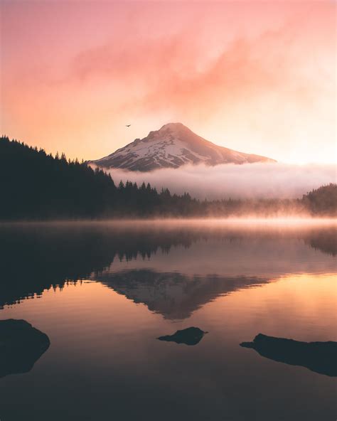 a colorful sunrise at Trillium Lake [OC] 3097 × 3871 : r/EarthPorn