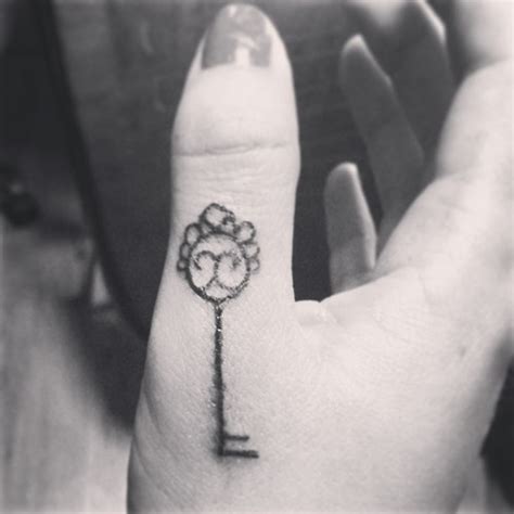 Little tattoo on finger