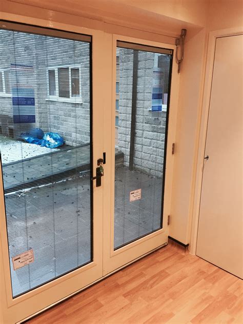 Care Home with Blinds Built into Glass