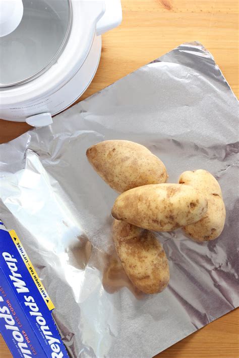 Easy Crock Pot Baked Potatoes - One Sweet Appetite