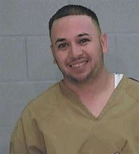 Why some criminal suspects smile in their mugshots