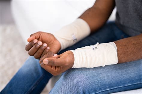 Bandaged Wrists After Cutting Veins Stock Photo - Download Image Now ...