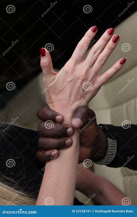 Hand Grabbing Wrist Stock Image - Image: 23128741