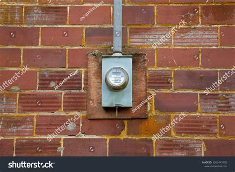 isolated view electrical meter mounted  stock photo edit