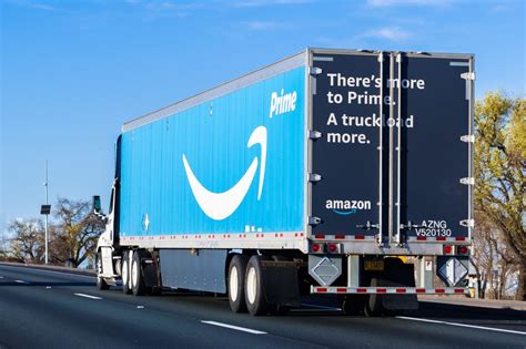 Amazon Truck Driving On The Highway – TopMark Funding