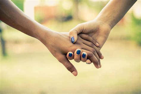 people holding hands  stock photo