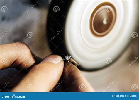 jeweler polishing jewelry stock photo image  blacksmith