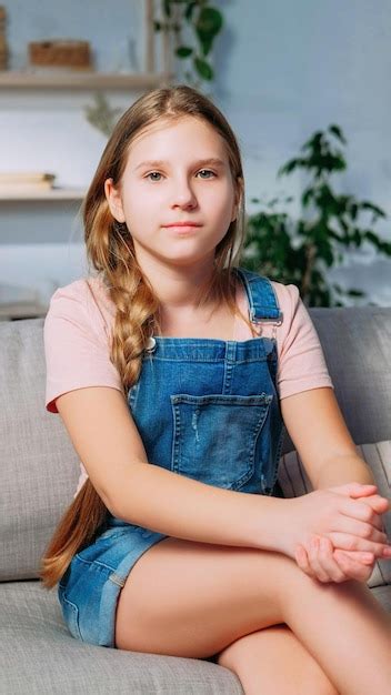 Premium Photo | Child portrait charming kid relaxed girl on couch