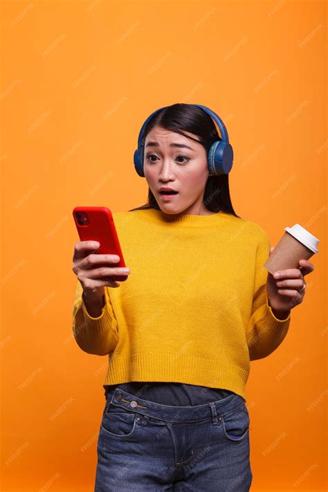 Premium Photo | Shocked speechless young adult woman reacting in fear