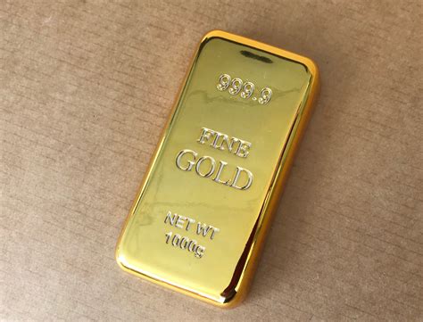 gold bar shaped paper weight gma products