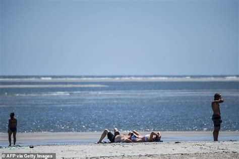 Woman caught performing intimate act near families on Georgia beach is