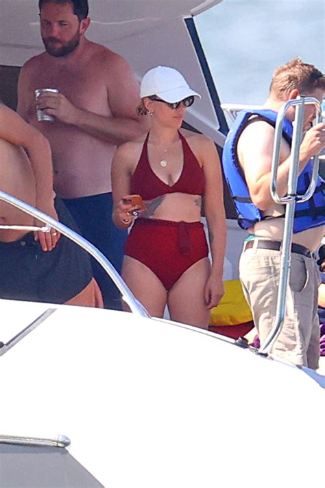 Scarlett Johansson shows off tattoos in red bikini in Hamptons