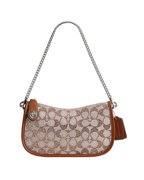 COACH Swinger in Brown | Lyst