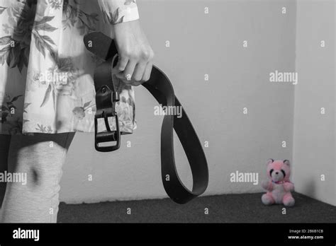 Punish belt hi-res stock photography and images - Alamy