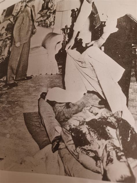 Bugsy Siegel with what I presume is his eye on the carpet after being