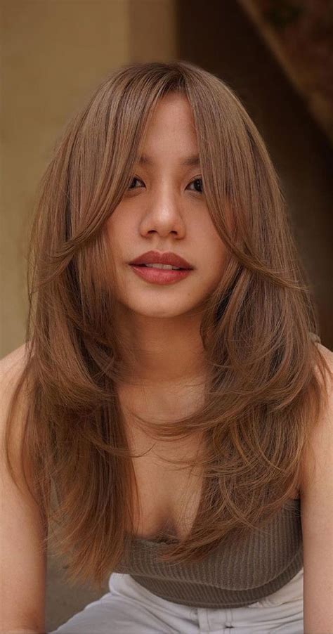 5 Simple Steps To Sleek Curtain Bangs At Home: A Guide For Long Hair