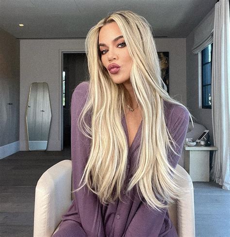 Khloé Kardashian's hair curling compared to Kendall's cucumber cutting