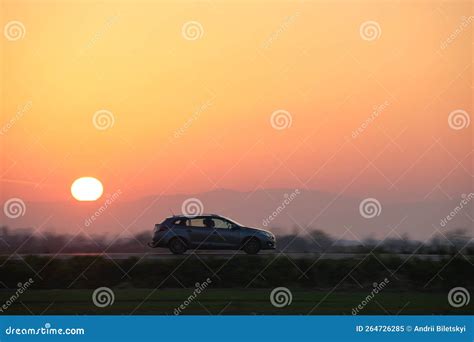car driving fast  intercity road  sunset highway traffic