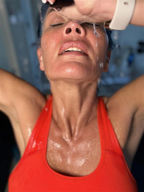 Wringing out the sweat. My eyes look like cherry tomatoes from the