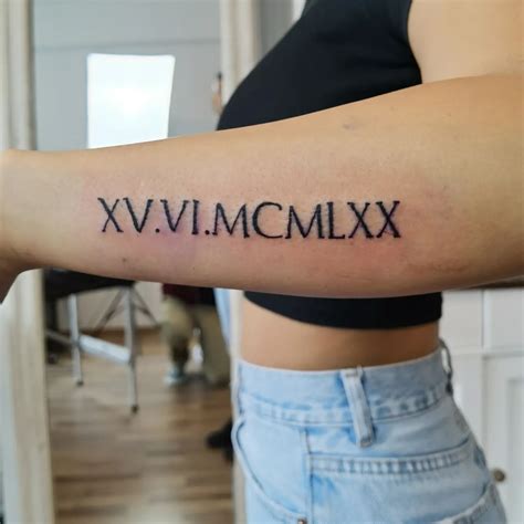 Roman Numeral Tattoo Arm