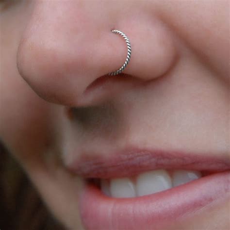 how to put in a twisted nose ring