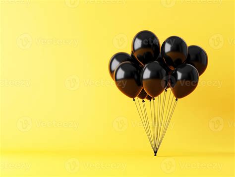 Black balloons contrast sharply with a bright yellow background