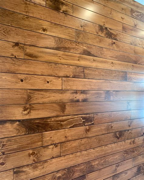 Pine paneling with nickel gap spacing and stain - Enterprise Wood Products