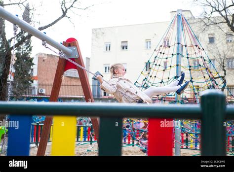 child swinging side  res stock photography  images alamy