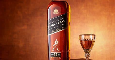 Bottle and Glass of Johnnie Walker · Free Stock Photo