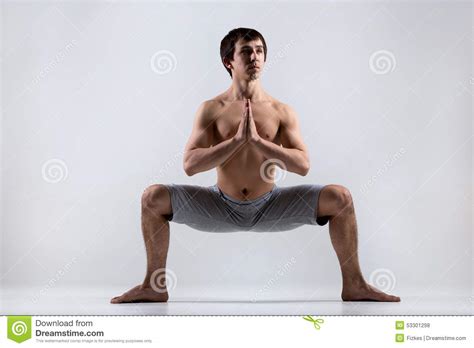 Yoga Goddess Pose (Utkata Konasana) Stock Photo - Image of male, asana ...