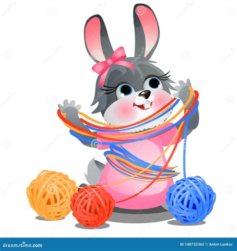 Cute Naughty Bunny Playing with Tangles of Woolen Colored Yarn Isolated