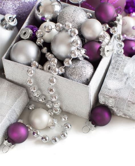 Premium Photo | Silver and purple christmas ornaments isolated on white