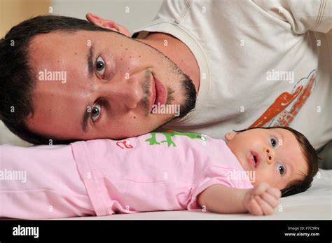 indoor portrait with happy young famil and cute little babby Stock ...