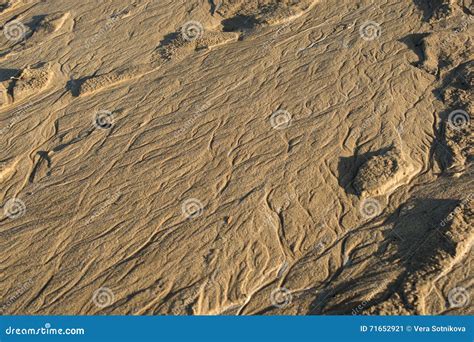 Patterns drawn on the sand stock image. Image of water - 71652921