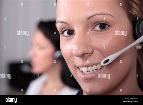 friendly staff telephone stock photo alamy