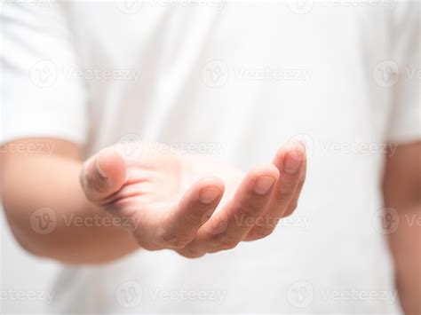 close  male hand hold somethinghand giving hope  stock photo
