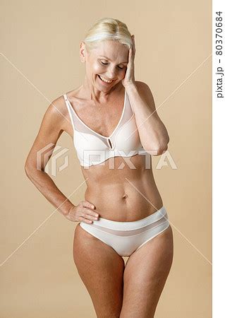 Charming mature woman in underwear with fit...の写真素材 [80370684] - PIXTA