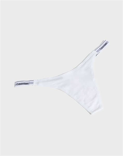 Osta Calvin Klein Underwear STRING THONG (DIPPED) - White | Nelly.com