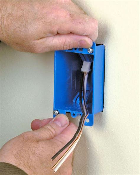 how to install an outlet in a finished wall