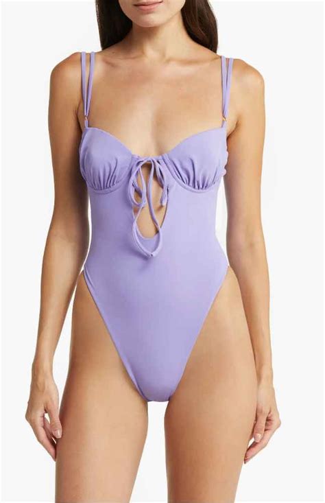 Shop Chrissy Teigen's Purple Norma Kamali One-Piece Swimsuit | PS Fashion