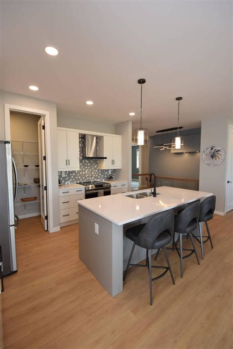 Loaded with features in Grande Pointe Meadows - Winnipeg Free Press Homes