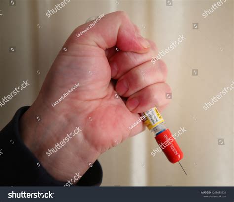 Injecting Emergency Medicine Epinephrine Auto Injector Stock Photo ...