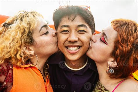 Happy diverse gay friends having fun together outdoor - LGBT and youth