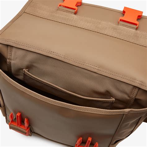 mens lacoste signature print water repellent messenger bag brown