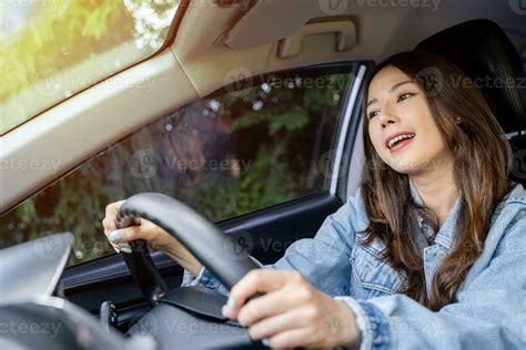 Happy Asian woman while driving in travel, people enjoying transport